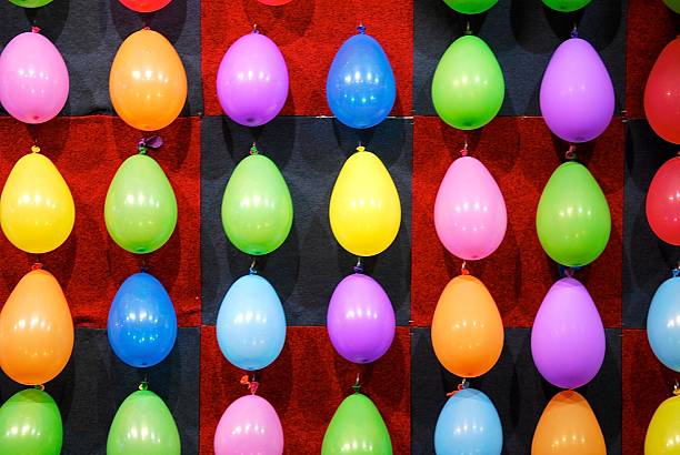 istock Full Frame Shot Of Colorful Balloons Arranged 606375911