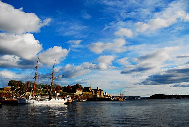 istock Ship Moored On Lake By City Against Sky 606380613