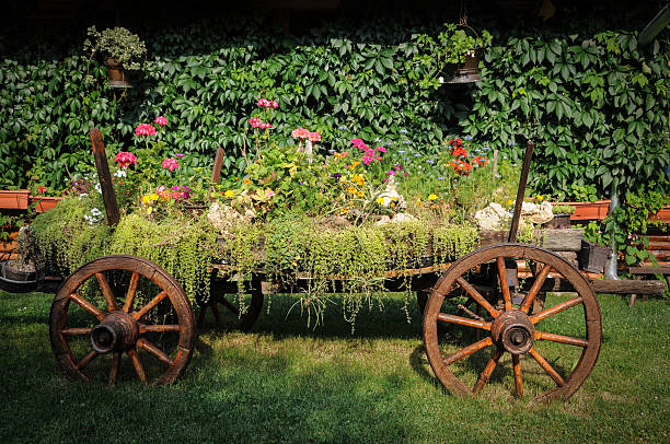 istock Flower decorated wooden cart 606631540