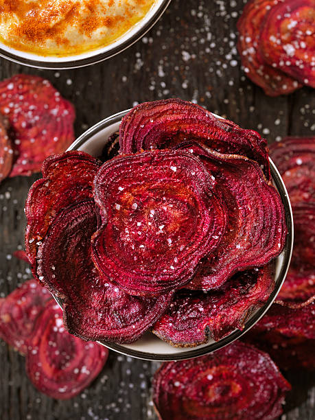 istock Sea Salted Beet Chips with a Hummus Dip 606632122