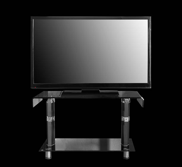 istock Tv with the stand on black 606633354
