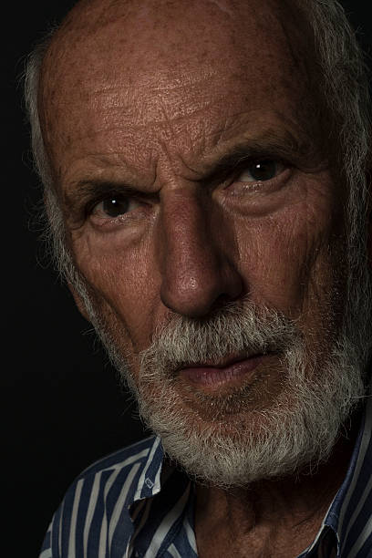 istock Serious Old Guy, Low-Key Grunge Lighting, Senior Man, Gothic Style 606635022