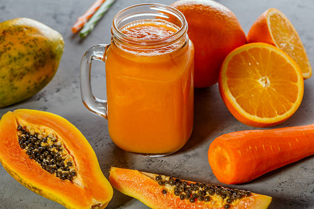 istock Papaya smoothie, selective focus. Detox, diet food. 606638830