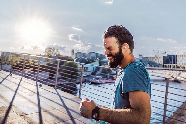 istock bearded sportsman fighting running on berlin bridge 606640270