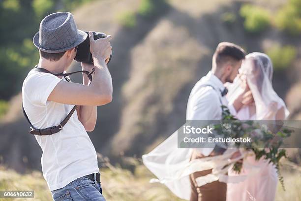 Photographer In Action Stock Photo - Download Image Now - Photographer, Wedding, Photograph