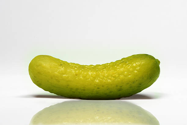 Gherkin GherkinPicklePickledCucumberCut OutDill PickleClose-upIngredientHorizontalExtreme Close-UpSeasoningClipping PathFood and DrinkVegetableMacroFoodFocus On ForegroundVegetarian FoodCondimentPhotographyYellowGreen Color dill pickle stock pictures, royalty-free photos & images