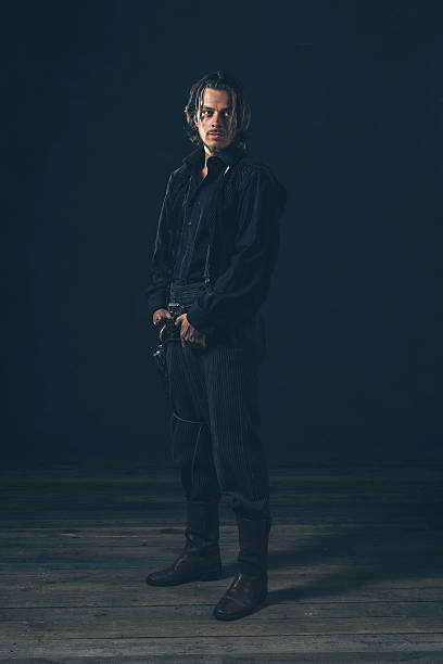 istock Retro 1900 western man. Young adult. Studio shot. 606657032