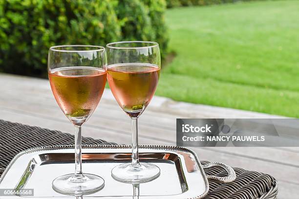 Two Glasses With Cold Rose Wine Stock Photo - Download Image Now - Serving Tray, Wineglass, Alcohol Abuse