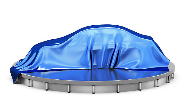 istock Car on the podium covered with a blue satin cloth 606665856