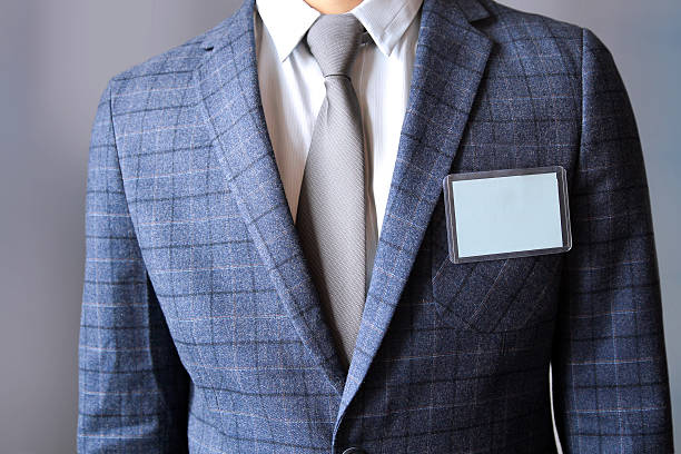 istock The business man standing with a Blank Badge 606666196
