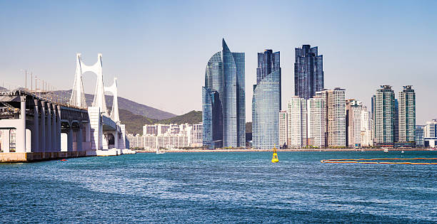 istock Busan panoramic skyline sunny afternoon with Gwangandaegyo Bridge 606667296