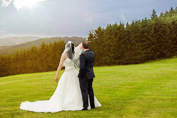 istock Bride and groom on their wedding day 606668140