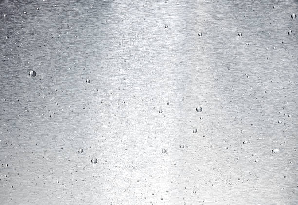 aluminum surface with drops of water