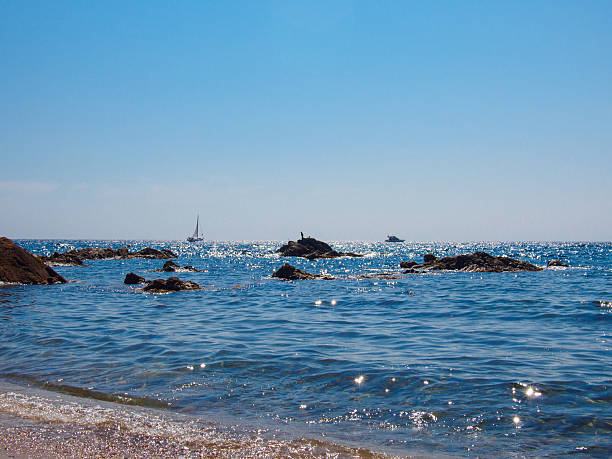 istock Sailboat and boat navigating in the Mediterranean Sea 606672444