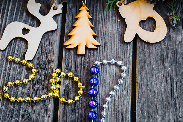 istock new year 2017, wooden toys on background 606673796