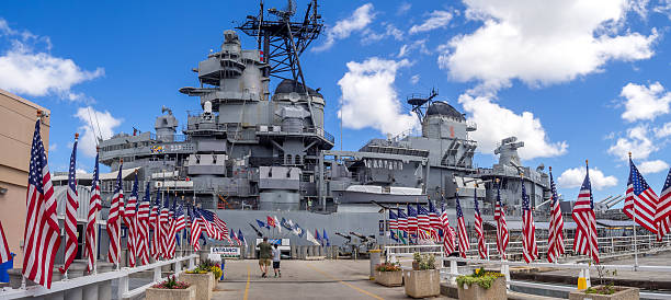 USS Missouri battleship museum Honolulu, USA - August 5, 2016: the USS Missouri battleship on August 5, 2016 in Pearl Harbor, USA. Site of the treaty signing ending WWII between the US and Japan, is now berthed in Pearl Harbor. pearl harbor stock pictures, royalty-free photos & images