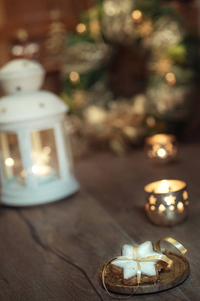 istock Candles and Christmas decorations on vintage kitchen 606674812