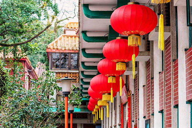 istock Red Chinese lanterns hanging from the roof 606675672