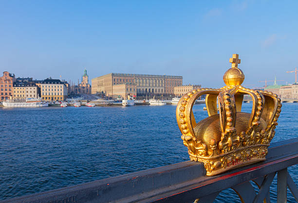 istock Royal crown and Stockholm cityscape 606676538
