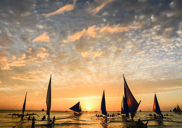 istock Several tourists are enjoying the spectacular sunset on the isla 606676658