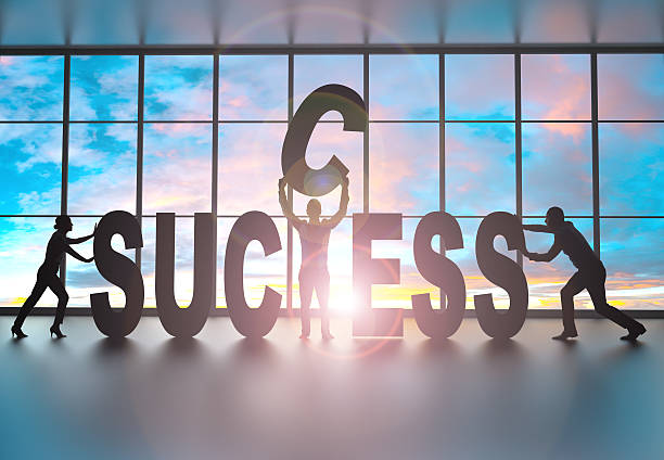istock Team building the word success 606679424