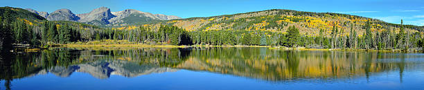 istock mountains and alpine lake with reflection in the fall 606703630
