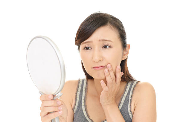 istock Woman with an uneasy look. 606703958