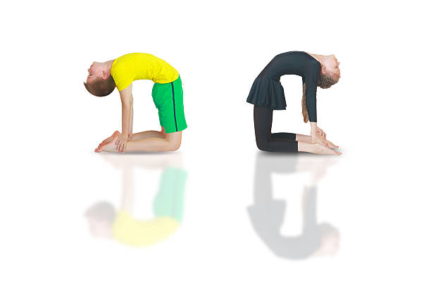 istock dhanurasana yoga 606704296