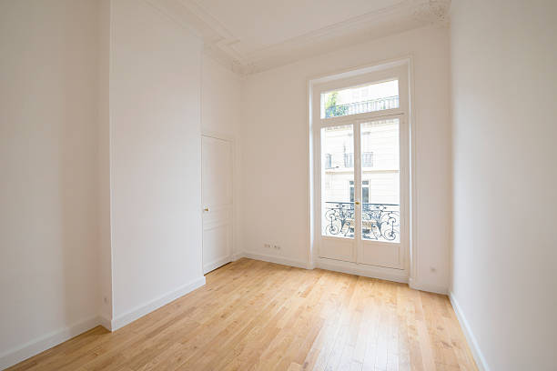 istock interior of empty room with parquet floor 606704360