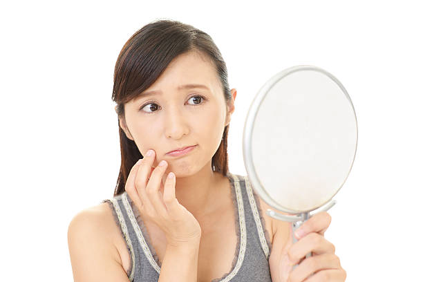 istock Woman with an uneasy look. 606704688