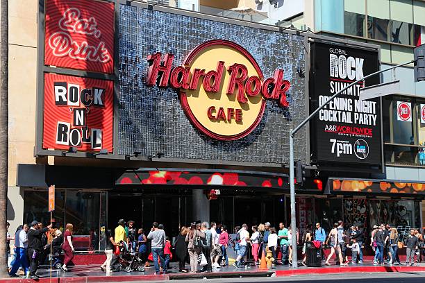 Los Angeles, USA - April 5, 2014: People visit Hard Rock Cafe in Hollywood. As of 2015 there are 191 Hard Rock locations around the world.
