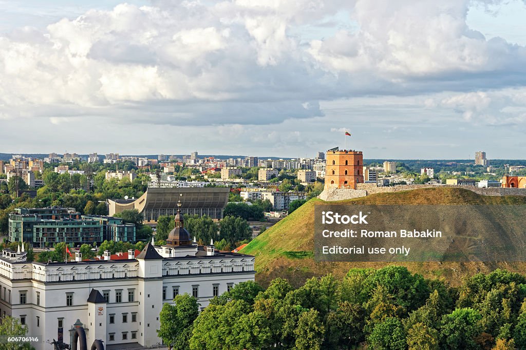 Gediminas Tower and the Lower Castle in Vilnius in Lithuania Vilnius, Lithuania  - September 3, 2015: Gediminas Tower on the hill and the Lower Castle down the hill in Vilnius in Lithuania. Gediminas Tower is also called as Upper Castle. Lithuania is one of the Baltic countries in the Eastern Europe. Analog Stock Photo