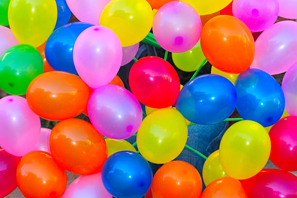 Bunch of colorfull balloons attached together stock photo