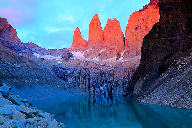 torres del paine granites sunrise, mirrored lake, chilean patagonia landscape - mountain reflection non urban scene moody sky imagens e fotografias de stock