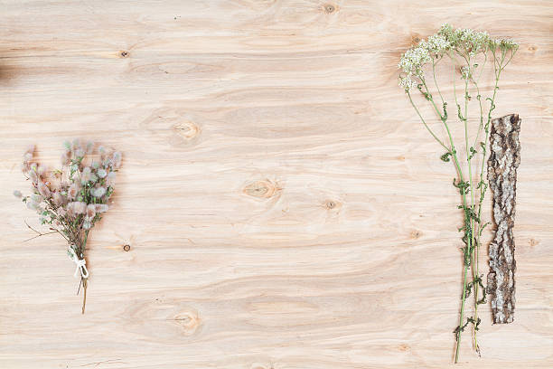 istock Dry flowers and herbs collage composition at wooden desk 606708534
