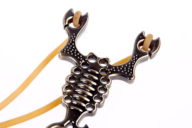istock Slingshot close-up, white background 606709024