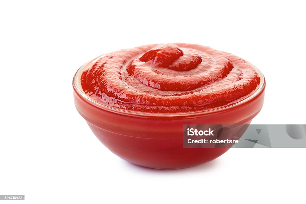 Bowl of ketchup or tomato sauce on white Bowl of ketchup or tomato sauce isolated on white background Ketchup Stock Photo