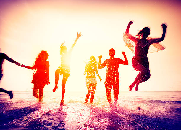 istock Friendship Freedom Beach Summer Holiday Concept 606711200