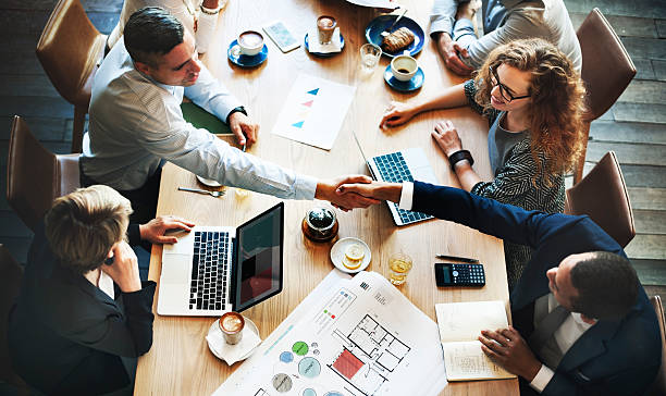 istock Business People Meeting Discussion Corporate Handshake Concept 606713764