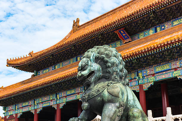 istock Bronze lions in front of the palace gate. 606714160