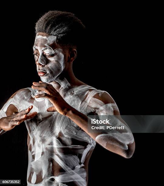 Black African Man With Body Paint Dancing Stock Photo - Download Image Now  - Adult, African Ethnicity, African-American Ethnicity - iStock