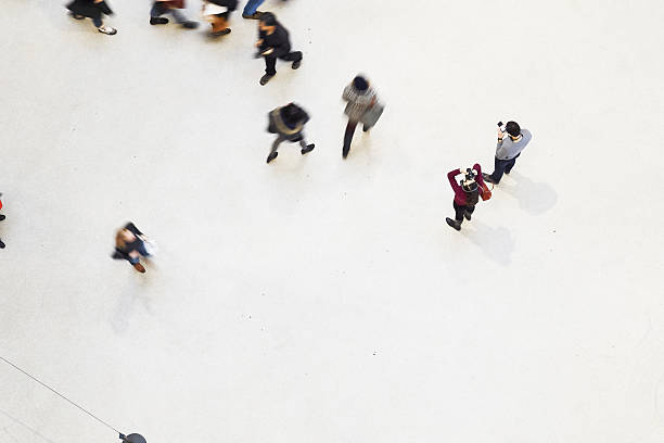 istock High Angle View Of People On Walkway 606757447