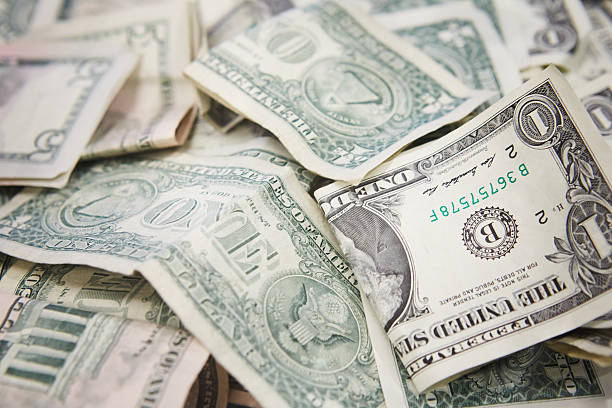 istock Full Frame Shot Of Us Paper Currencies 606758047