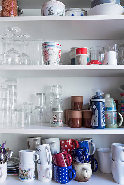 istock Various Glasses And Containers In Shelves At Home 606758589
