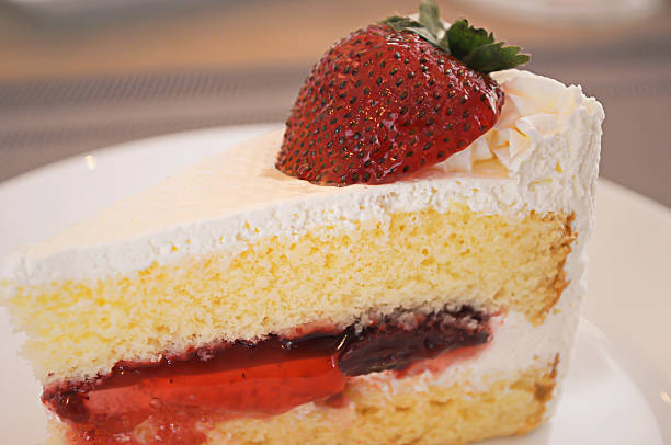 istock Strawberry short cake on white dish the delicious. 607252462