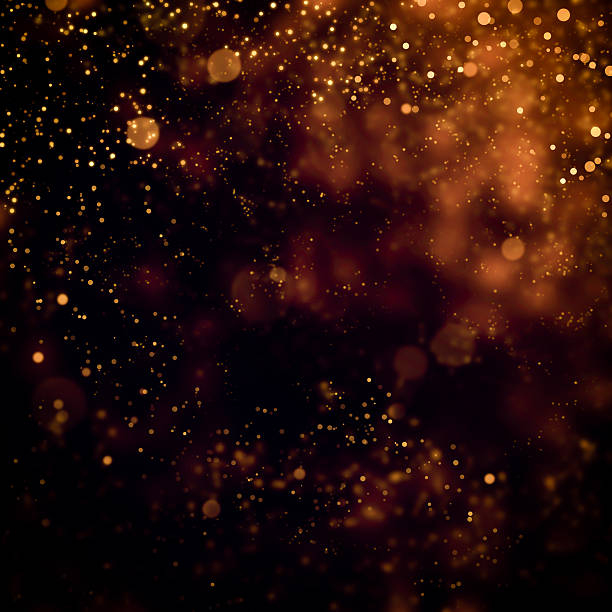 istock glittering stars on bokeh background 607253706