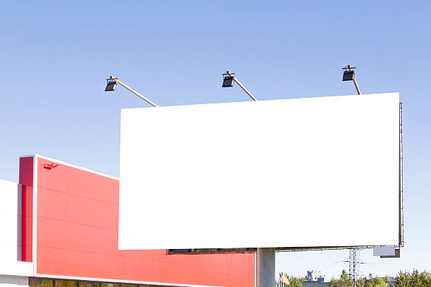 istock Blank billboard in the city against blue sky 607253726