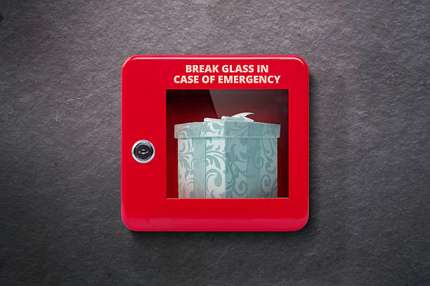 Emergency case with break away glass Red lock box with glass to be broken in case of emergency emergency break glass box stock pictures, royalty-free photos & images