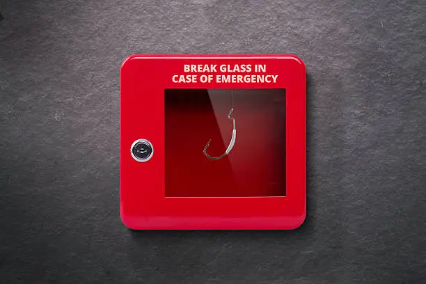 Red lock box with glass to be broken in case of emergency