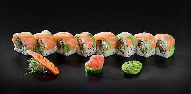 istock Fresh salmon Uramaki Sushi roll, party set 607255246